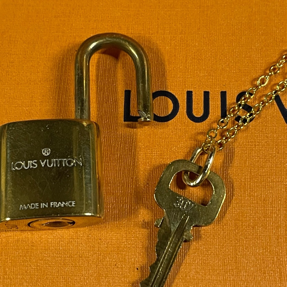 EUC Louis Vuitton Solid Brass Padlock and Key. #307